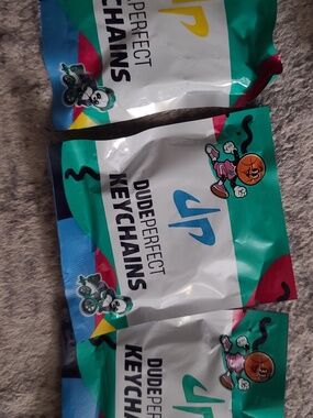 Lot of 4 Dude Perfect Keychains New in Plastic